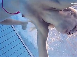 sizzling Elena showcases what she can do under water